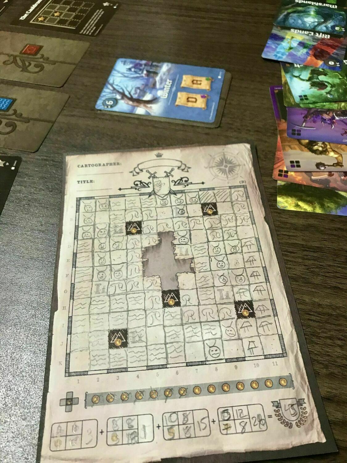 Cartographers: Une Épopée dans l'Univers de Roll Player Eclate